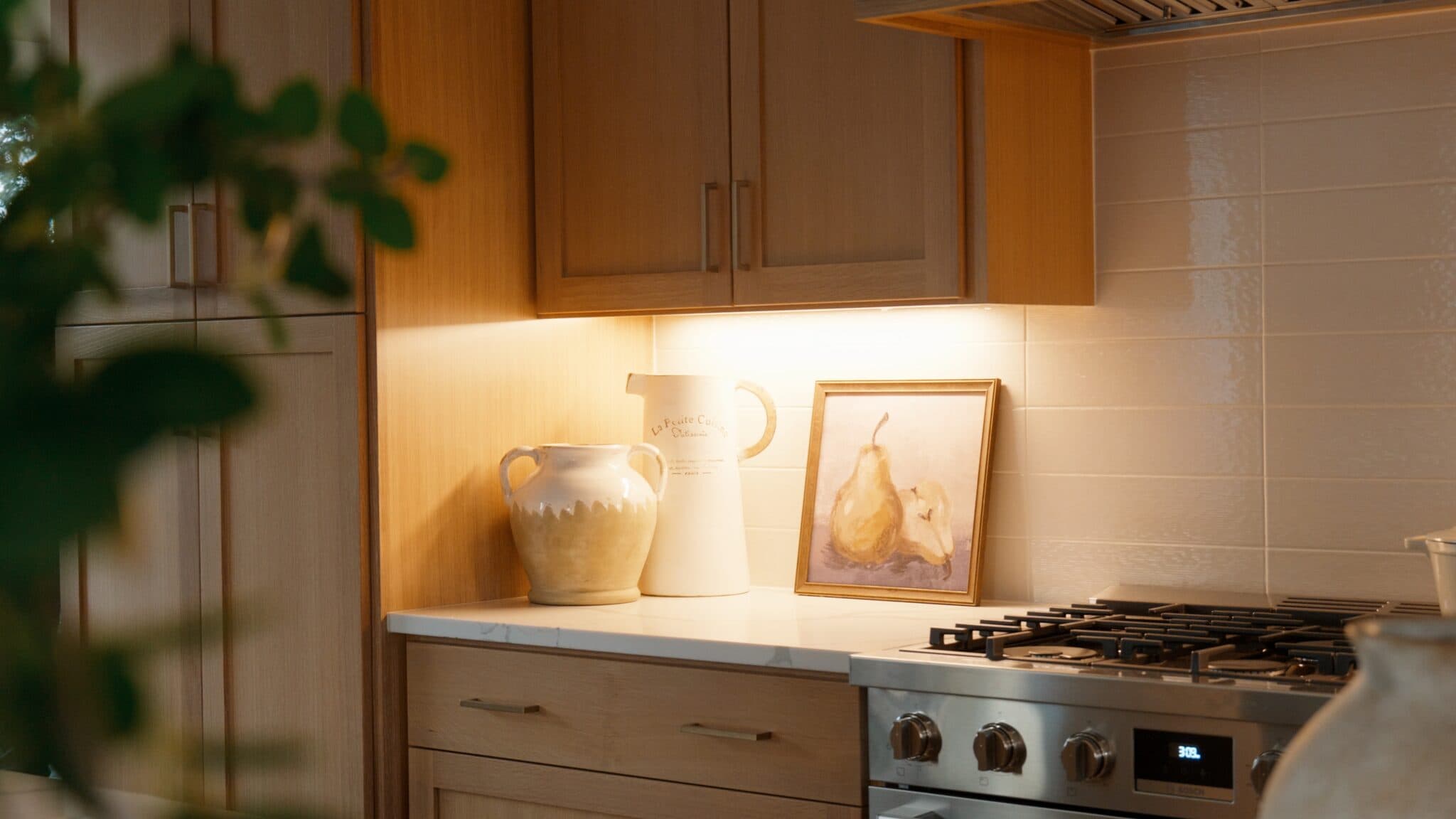 Kitchen detail with gas range and warm lighting — real estate photography by Hahn Media, Oregon